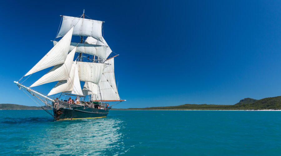 Tall ship with sails up